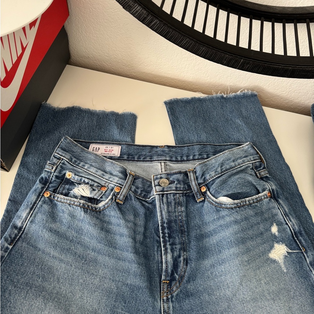 Distressed Blue Denim Jeans